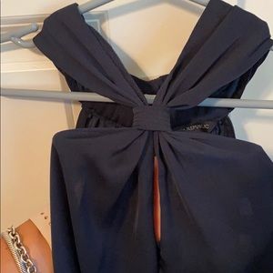 Navy peephole blouse with buttoned back